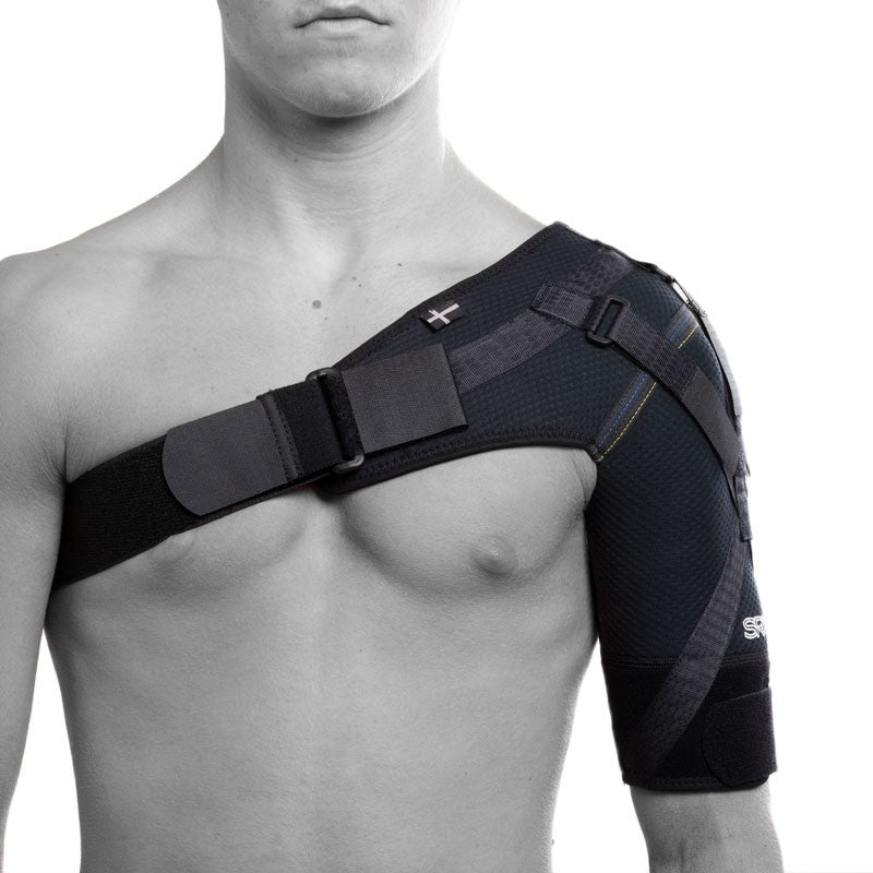 SRX shoulder brace with stabilizing strapt, with heat and compression for an unstable shoulder joint